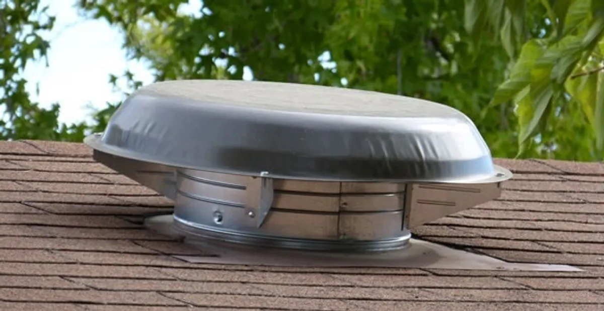 attic fan installation services with low-profile roof ventilation unit in Tucson, AZ