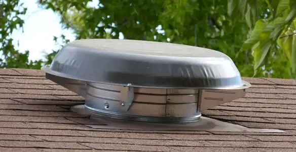 attic fan installation services with low-profile roof ventilation unit in Tucson, AZ