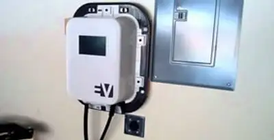 Electric car charger installation with wall-mounted EV charging station in Tucson, AZ