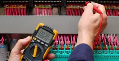 electrical service showing professional testing and troubleshooting of electrical panel by licensed electricians in Tucson, AZ