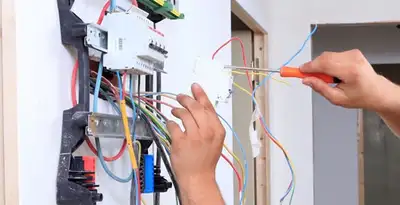 electrician services performing residential electrical panel wiring in Tucson, AZ