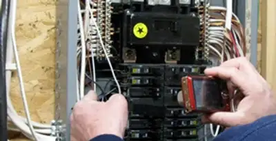 Home electrical inspection of circuit breaker panel by licensed electrician in Tucson, AZ