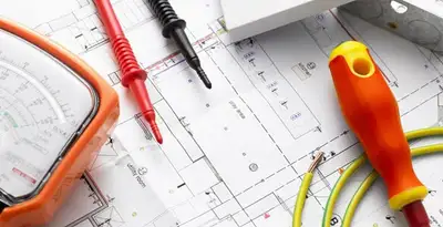 licensed electrician planning and testing electrical systems using professional tools in Tucson, AZ