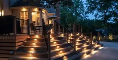 Residential electrician installing outdoor lighting for home safety in Tucson, AZ