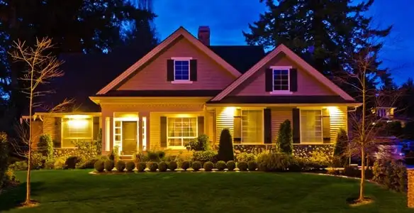 security light installation services illuminating a residential exterior at night in Tucson, AZ