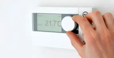 Thermostat installation service with professional adjusting temperature control in Tucson, AZ