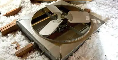 whole house fan installation services with attic-mounted ventilation unit in Tucson, AZ